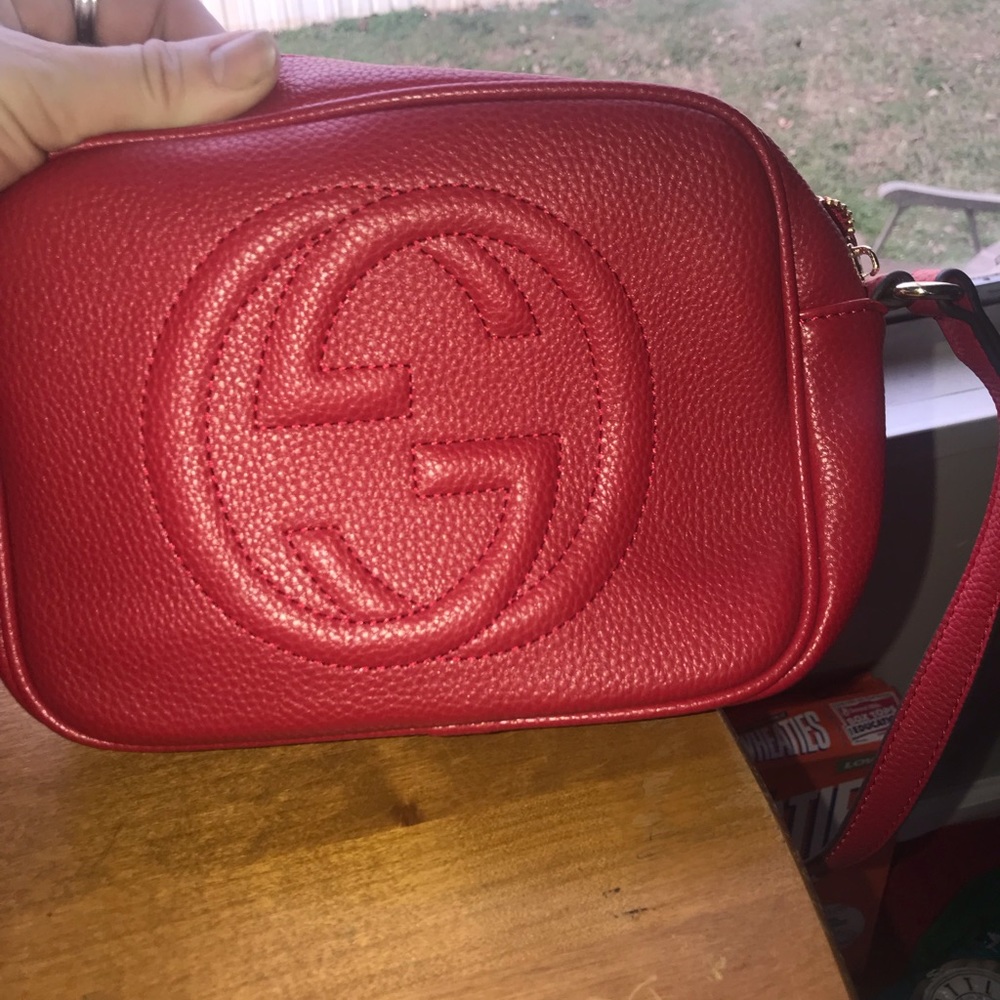 Gucci small shoulder purse. Coral/ red, never used.
